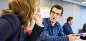 Attendees in discussion at a Strengthify event