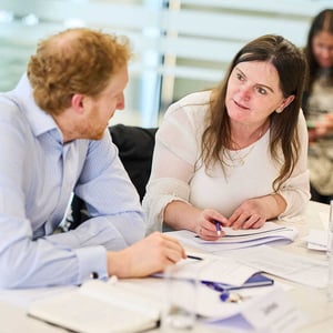 Attendees at a Discovery Workshop disccusing their Strengthify Profile