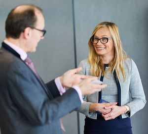 Two colleagues talking to each other