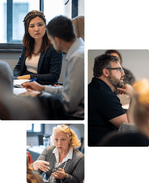 Attendees deep in conversation at a management development programme