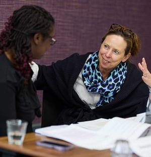 Two leaders in conversation at a Management Development Programme