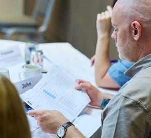 An attendee reading their Strengthify Profile report